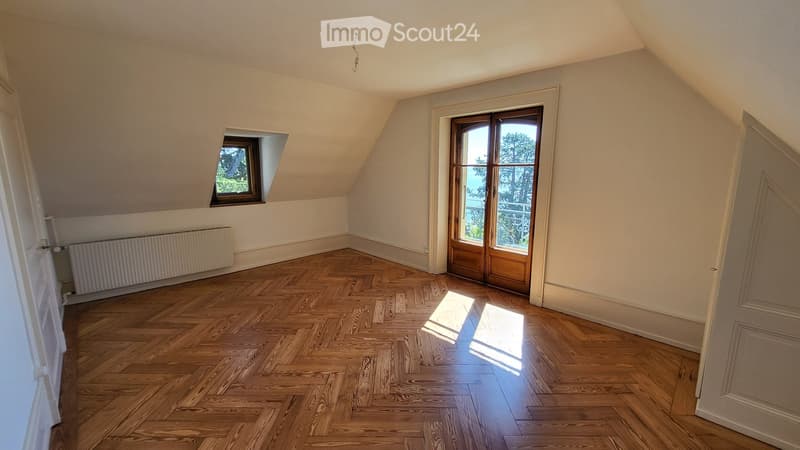 wooden parquet floor, white walls, wooden door, wooden window, balcony