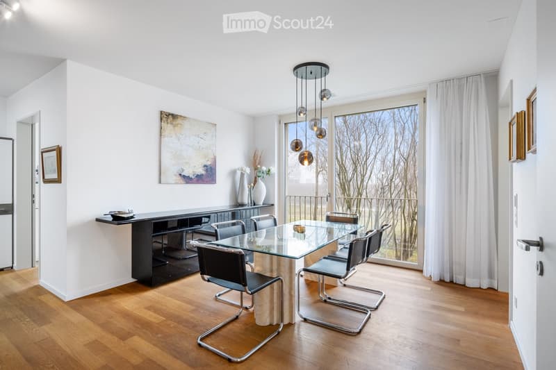 glass dining table, marble leg, white walls, black cabinets, chandelier, glass door