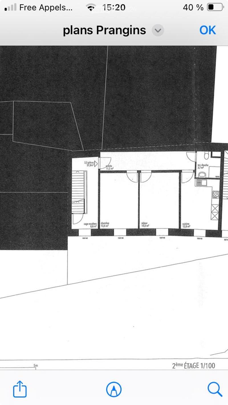 Floor Plan. Floor plan of a second-floor apartment showing a living room, kitchen, bedroom, and bathroom with labeled dimensions.