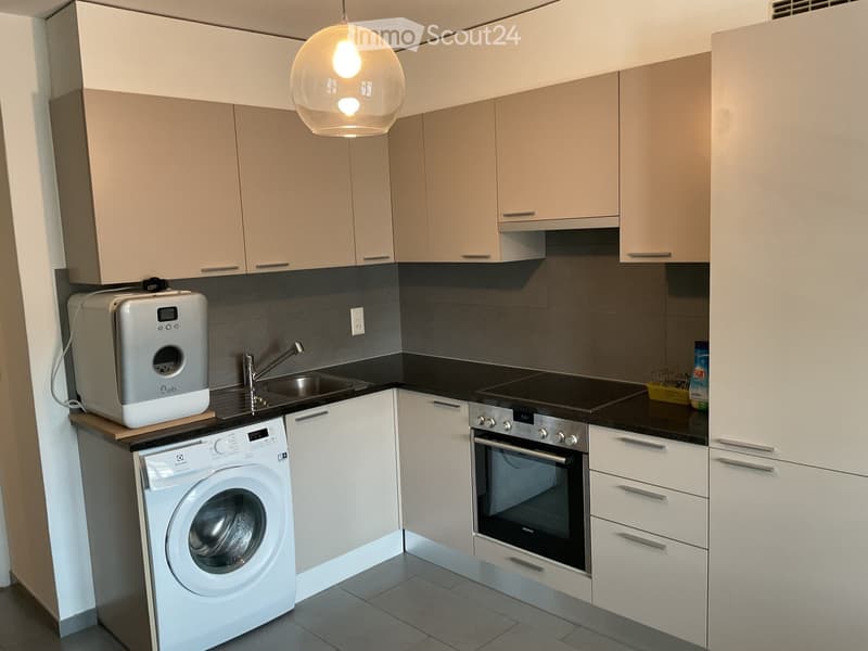 Kitchen. Modern kitchen with light-colored cabinets, stainless steel appliances, and a sleek design.