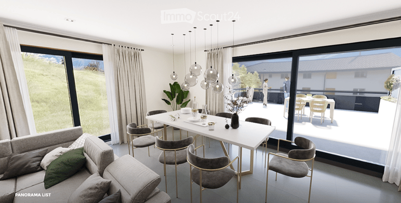 Modern living and dining area with large windows offering a scenic view, featuring a grey sectional sofa, a white dining table with six chairs, pendant lights, and decorative items.