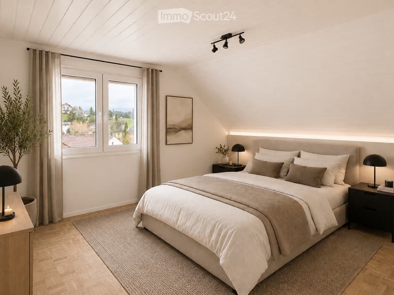 Modern bedroom with a large bed, nightstands, lamps, a picture frame, and a plant near the window.