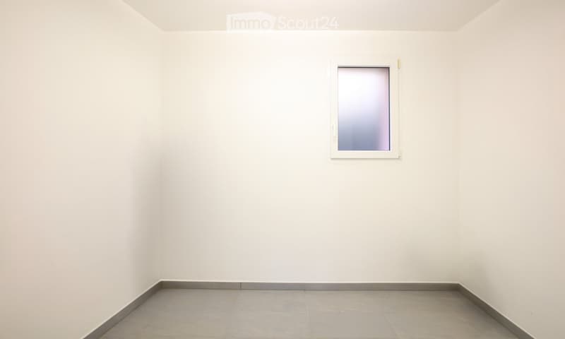 Empty room with a single window