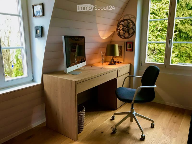 study room, wooden desk, monitor, lamp, chair, small storage basket