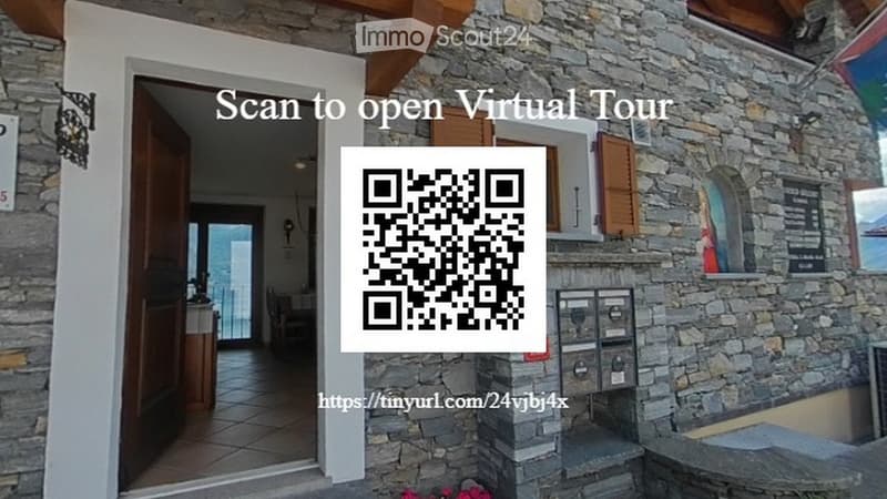 Building: stone wall, wooden door, open door, balcony, QR code