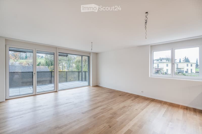 empty room, wooden floor, sliding glass doors, balcony, large windows, white walls