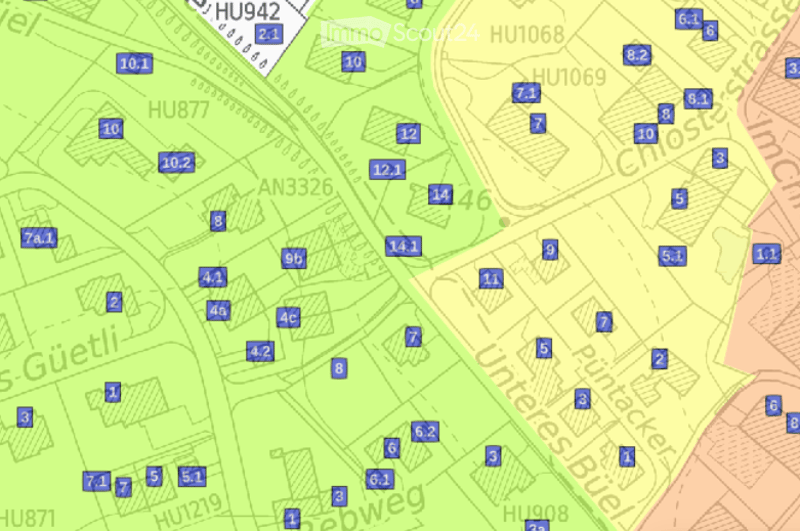 A detailed map showing a residential area with numbered plots and labeled streets, including HU942, HU1068, HU1069, HU877, AN3326, S. Güetli, Unteres Biel, Puntacker, and Sepweg.