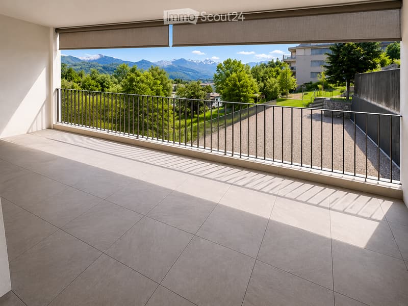 Balcony with tiled floor, metal railing, and scenic mountain view in the background.