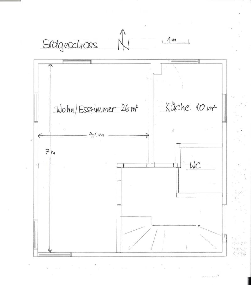 Floor plan of the top floor showing a living/dining room (26 m²), kitchen (10 m²), and bathroom (WC). Dimensions and orientation are indicated.