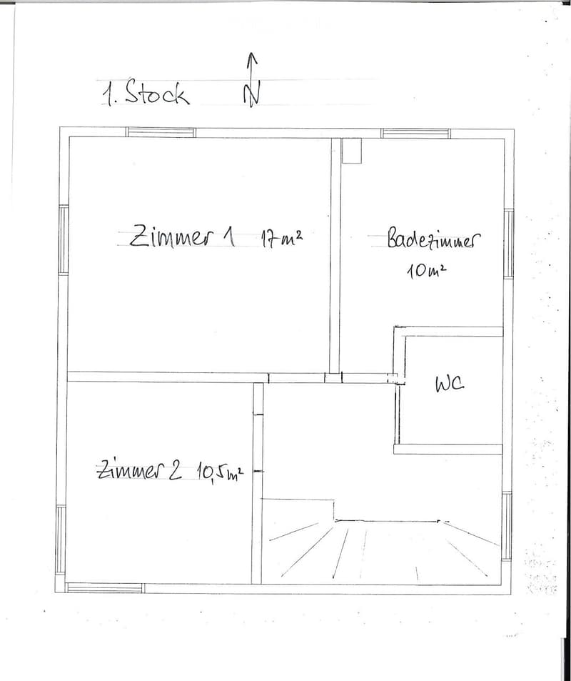 Floor plan of the first floor showing two bedrooms, a bathroom, and a WC.