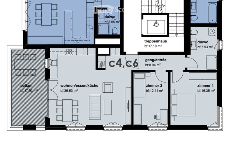 Floor plan showing a living/dining/kitchen area, two bedrooms, two bathrooms, a staircase, and a balcony.