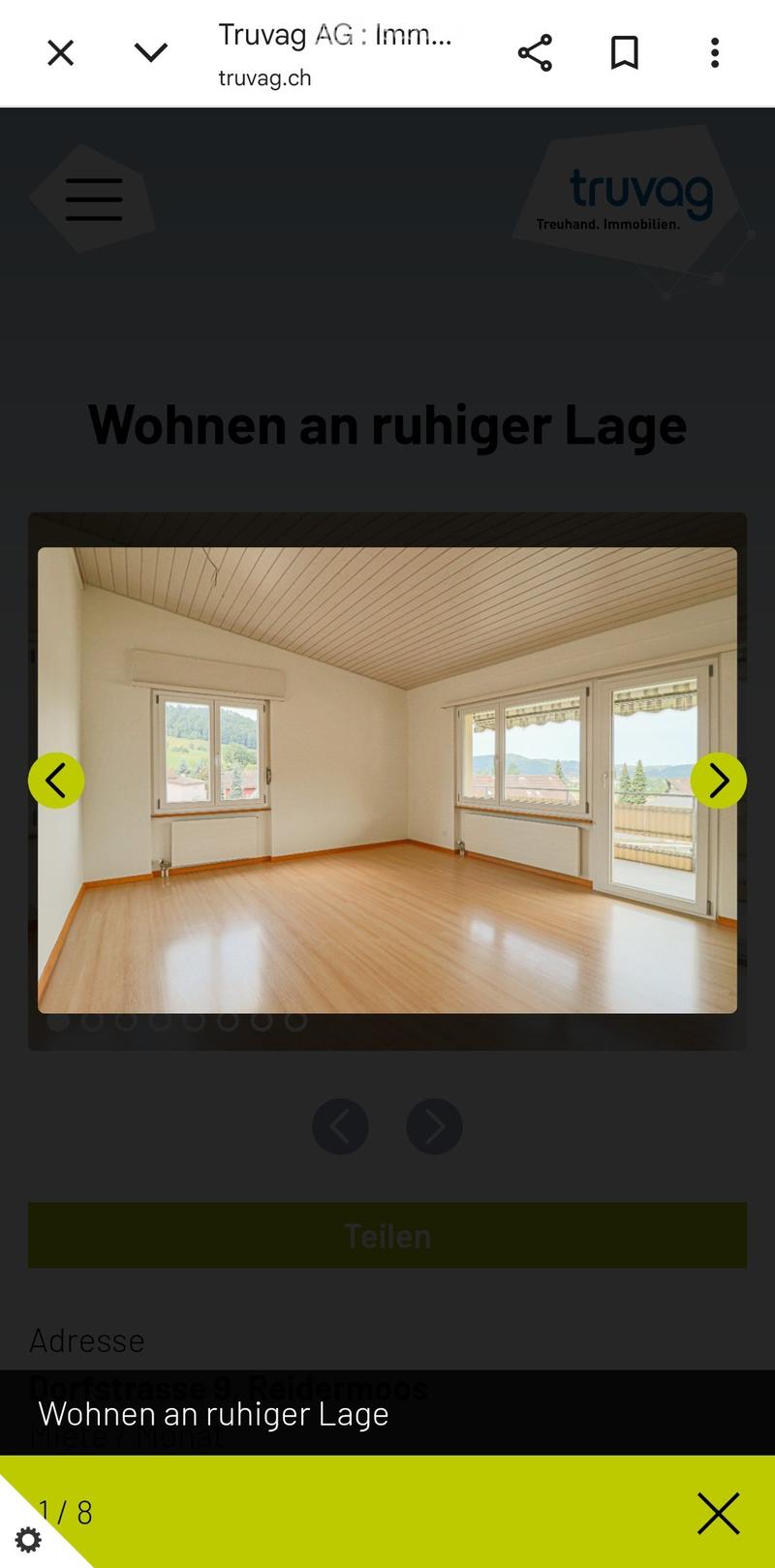Empty room with wooden flooring, white walls, large windows, and radiators.