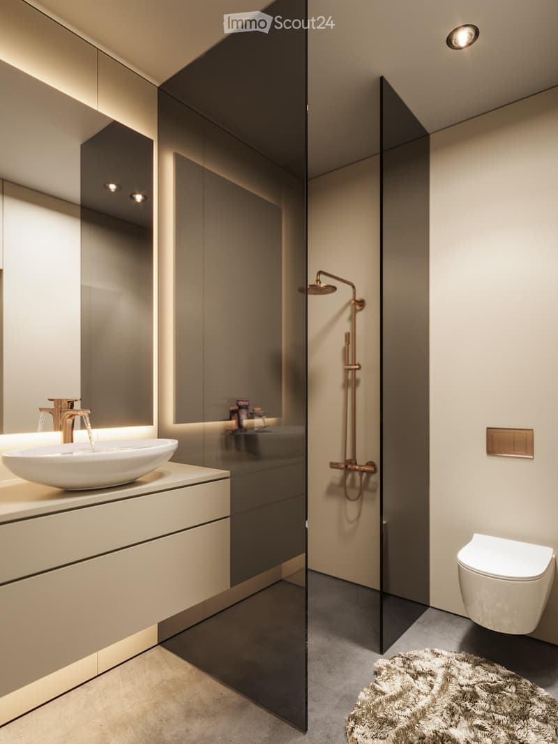A sleek and modern bathroom with a large mirror, a copper shower head and faucet, and a built-in sink with a modern faucet