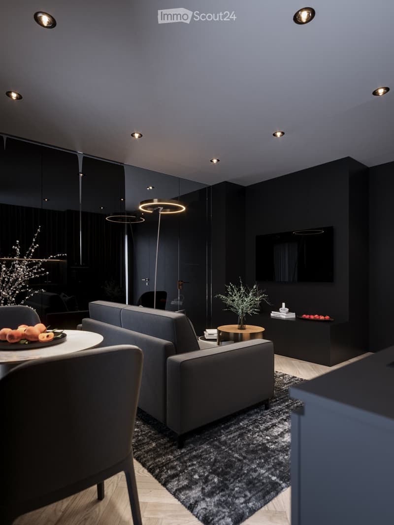 Interior with black walls, grey couch, table, TV, carpet