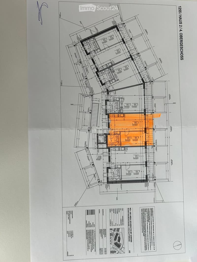 Architectural floor plan of a multi-story building, showing detailed layout with labeled rooms, corridors, and structural elements.