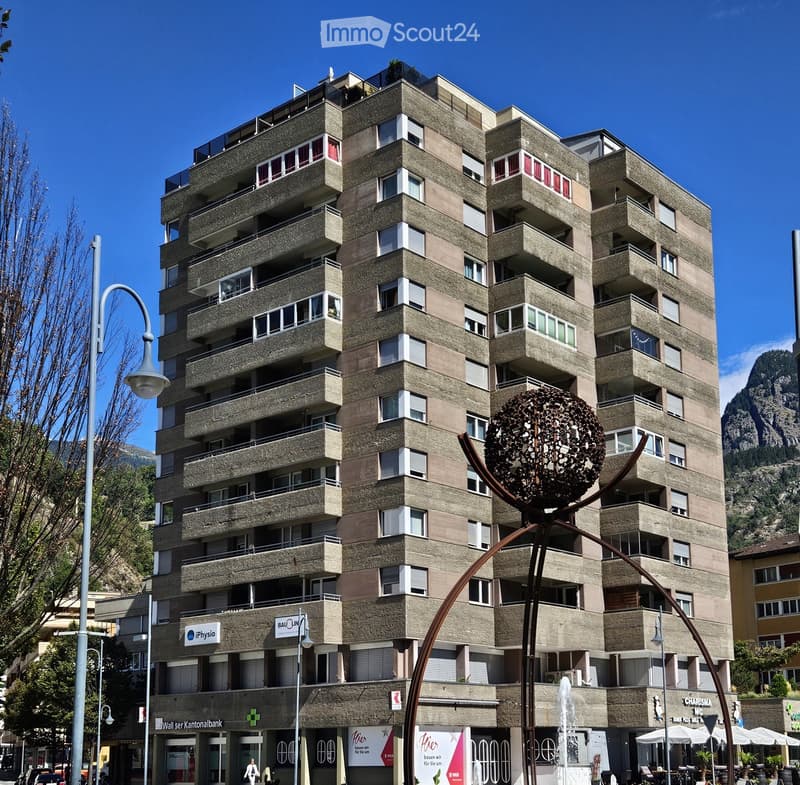 Apartment building with many balconies, windows, modern architecture