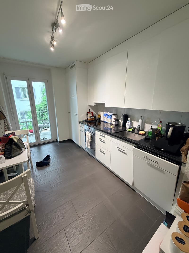 {"type": "Kitchen", "objects": ["refrigerator", "oven", "sink", "faucet", "coffee maker", "chair", "table", "oven mitts", "oven gloves", "oven", "oven", "oven", "oven", "oven", "oven", "oven", "oven", "oven", "oven", "oven", "oven", "oven", "oven", "oven"