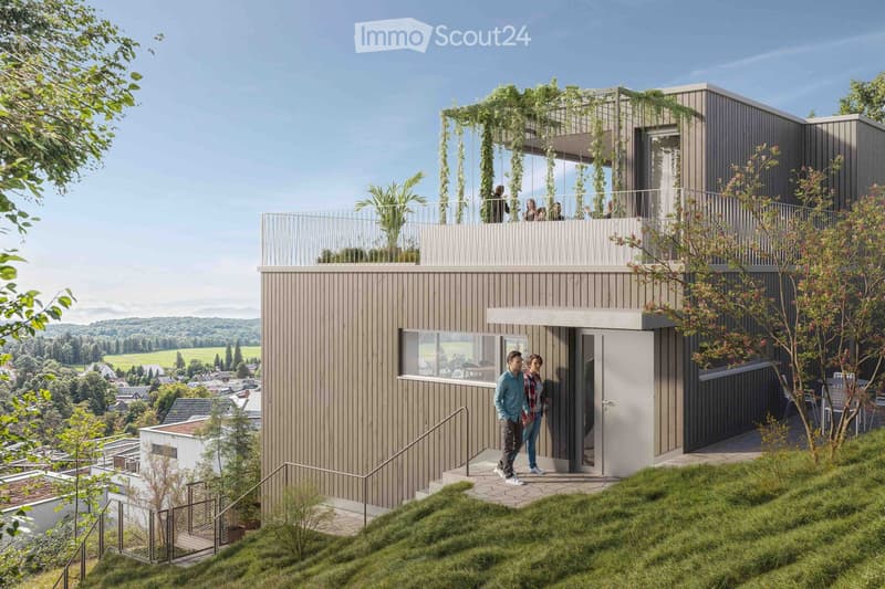 Modern two-story house with wooden exterior, large windows, raised ground floor, balcony, and greenery on the roof.