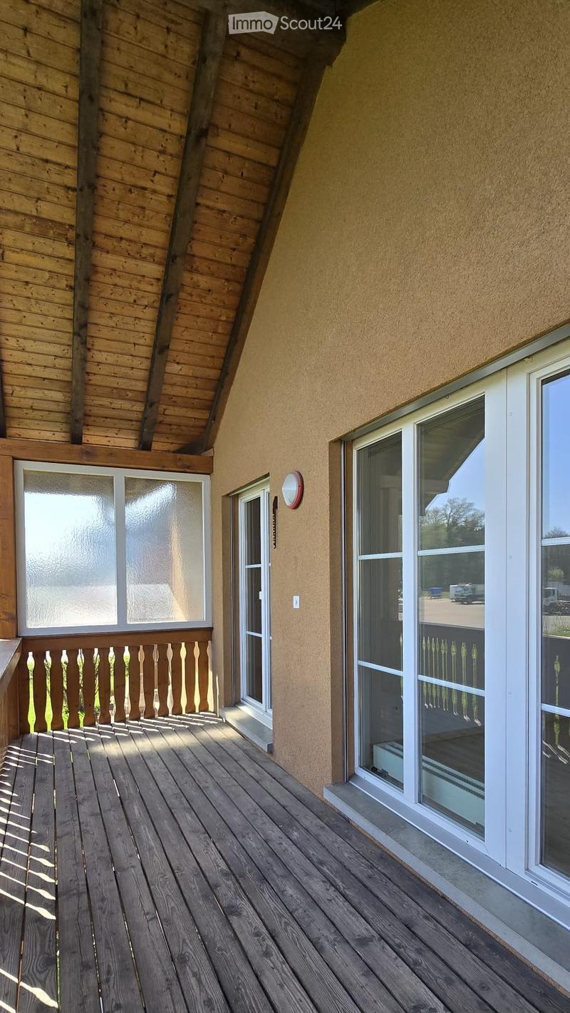 wooden deck, wooden railing, glass doors, wooden ceiling