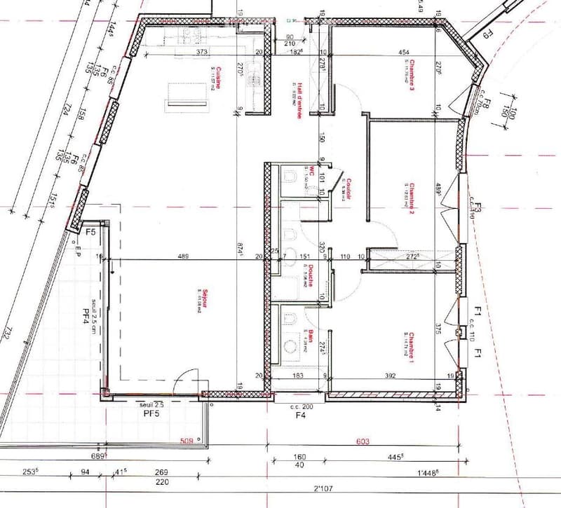 Floor plan of a building showing multiple rooms including a living room, kitchen, bedrooms, bathrooms, and a hallway.