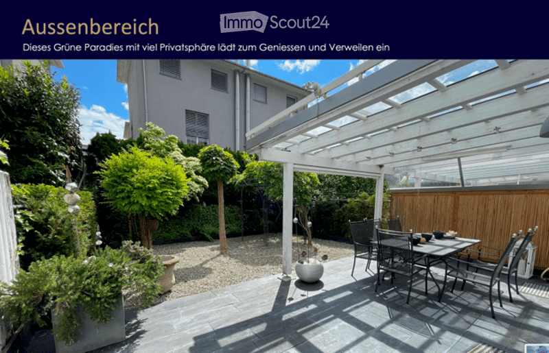 A well-maintained garden area with a patio, outdoor furniture, and a pergola. The space includes potted plants, a gravel pathway, and a modern outdoor dining setup.