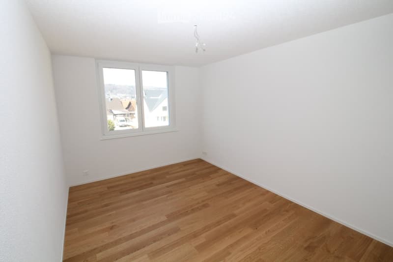 {"visible_features": [],    "type": "Room",    "description": "empty room with wooden floor, white walls, a window, and an outlet",    "localized_descriptions":        {        "EN": "Empty room with wooden floor, white walls, a window, and an outlet