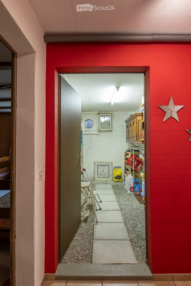 storage room, wooden door, red wall, wooden floor, white floor, rack