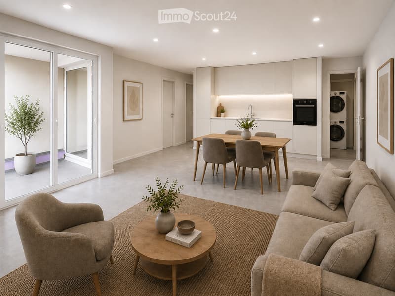 Modern open-plan living and dining area with a sofa, armchair, coffee table, dining table with chairs, and a kitchen area with cabinets, oven, and washing machine. The space features large windows, a potted plant, and decorative artwork.