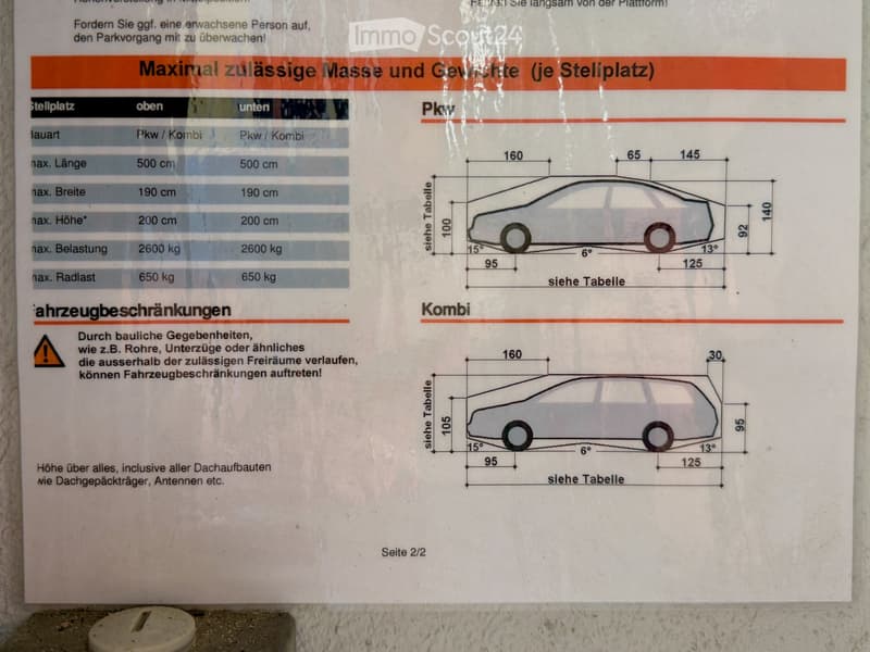 A signboard displaying parking regulations and vehicle dimensions, including tables and illustrations for cars and vans.