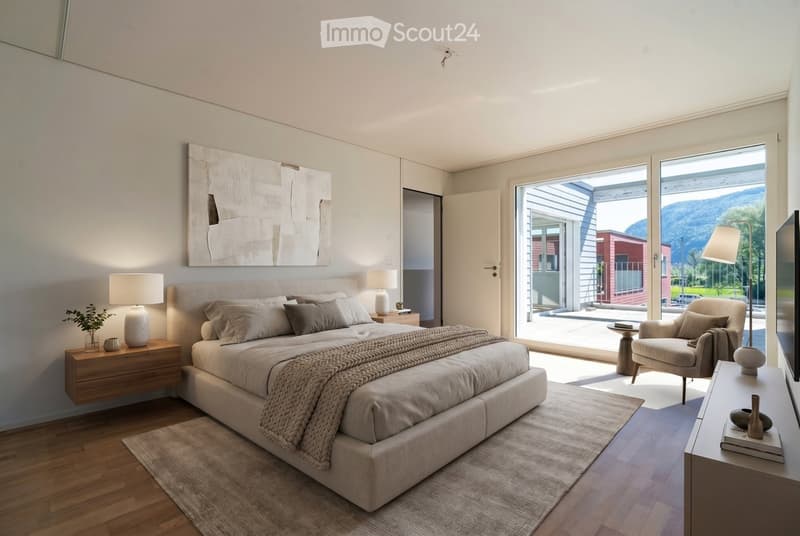 Modern bedroom with a large bed, nightstands, lamps, a chair, and a view through large windows.