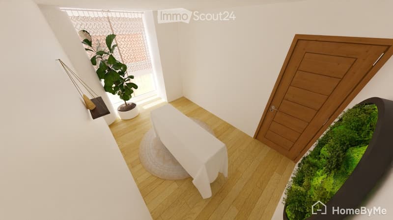 A small, modern room with wooden flooring, a round stool covered with a white tablecloth, a potted plant near the window, and a wooden door.