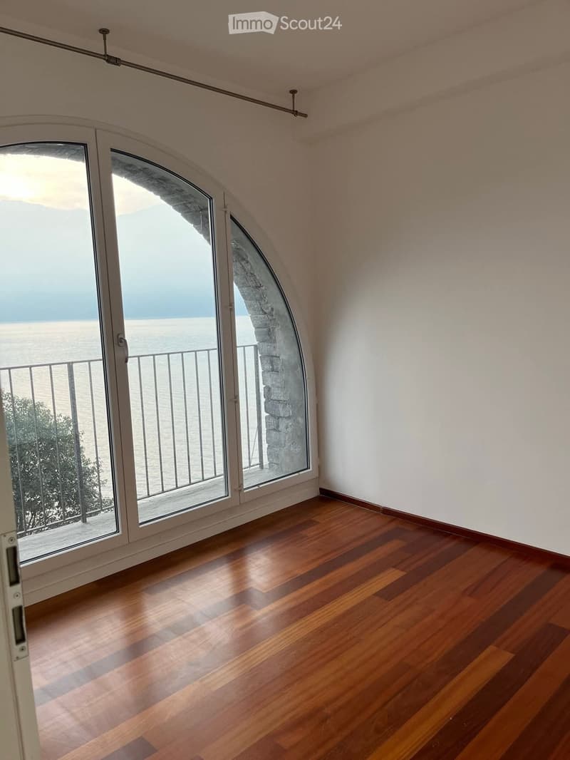 wooden floor, large arch windows, balcony, panoramic sea view