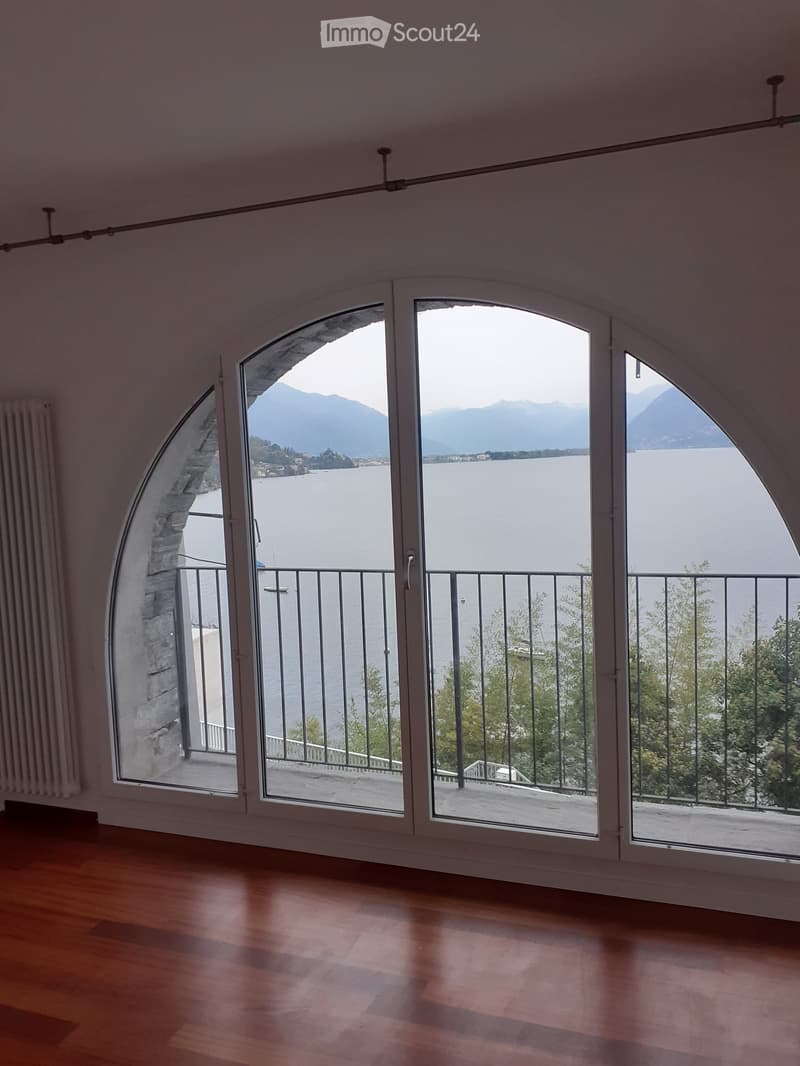 empty room with sliding glass doors and balcony