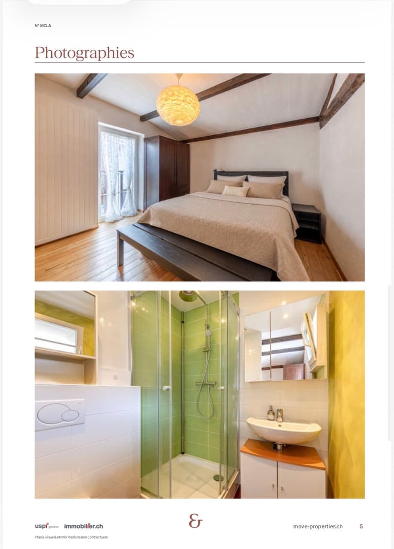 Cozy bedroom with wooden floor, exposed wooden beams, large window with white curtains, bed with pillows and blanket, nightstand, and wardrobe.