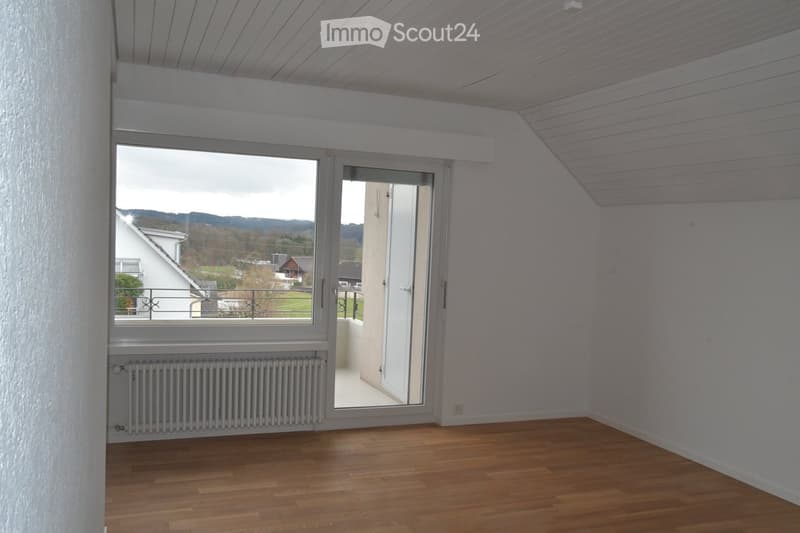 empty room, wooden floor, white walls, sliding glass door, balcony, radiator, view of the outside
