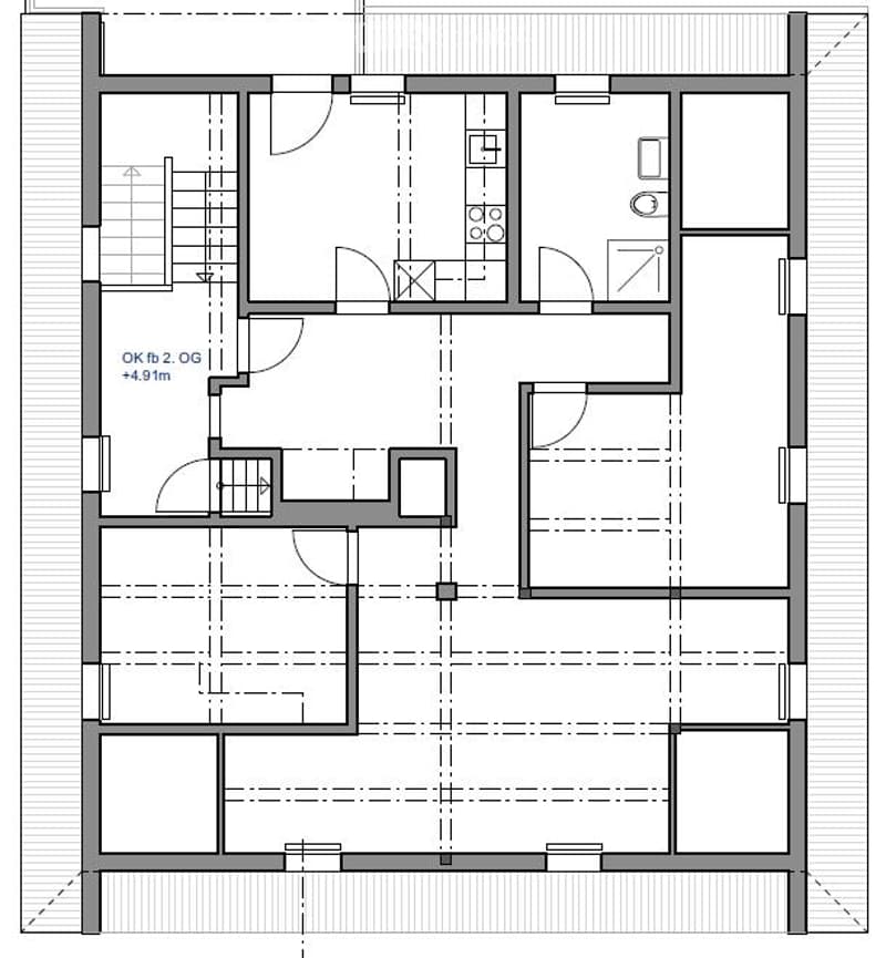 Floor plan of a two-story house with multiple rooms including living room, dining area, kitchen, bedrooms, and bathrooms.