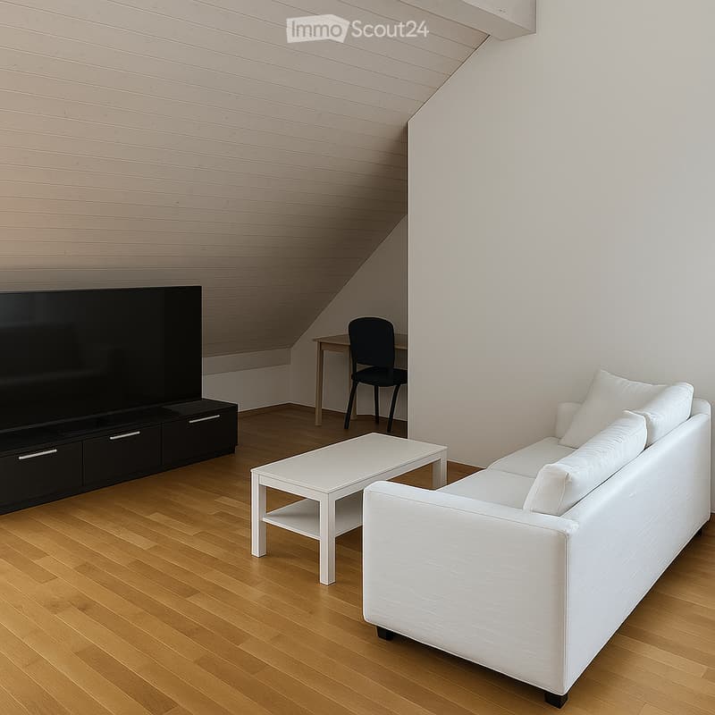Modern living room with white sofa, white coffee table, black TV stand, and a small table with a chair in the corner.