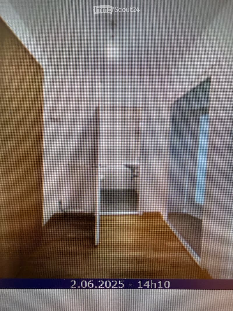 Completely empty room with bare walls and wooden floor. No furniture or equipment.