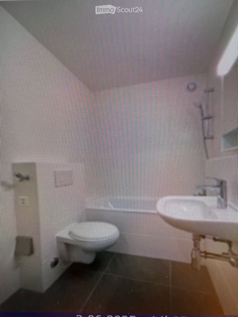 Completely empty room with bare walls and wooden floor. No furniture or equipment.