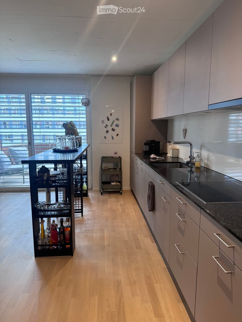{"type": "Kitchen", "objects": ["cabinet", "sink", "faucet", "coffee maker", "bar cart", "cup", "bottle", "fridge", "faucet", "faucet", "bottle", "bottle", "bottle", "bottle", "bottle", "bottle", "bottle", "bottle", "bottle", "bottle", "bottle", "bottle",