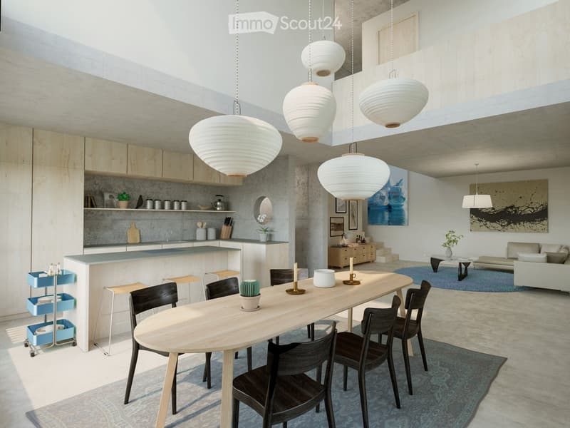 Open-plan kitchen and living area with modern design, pendant lights, a long wooden dining table with chairs, a sofa, coffee table, and kitchen island with cabinets and appliances.
