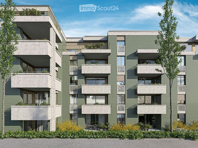 Modern multi-story residential building with green tiled facade, balconies, and landscaped surroundings.