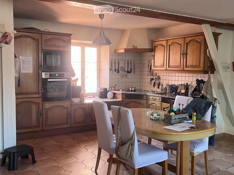 {"type": "Kitchen", "objects": ["cabinet", "oven", "microwave", "table", "chair", "stool", "faucet", "bottle", "cup", "bottle", "bottle", "bottle", "bottle", "bottle", "bottle", "bottle", "bottle", "bottle", "bottle", "bottle", "bottle", "bottle", "bottle