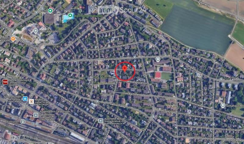 A map view of a residential area in Wallisellen, showing streets, buildings, and landmarks such as WaterWorld Wallisellen and Stadt Wallisellen.