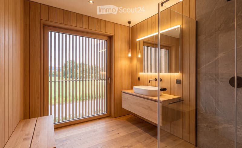 Modern bathroom with wooden walls, a large window with vertical blinds, a floating sink with a modern faucet, and a glass-enclosed shower area.