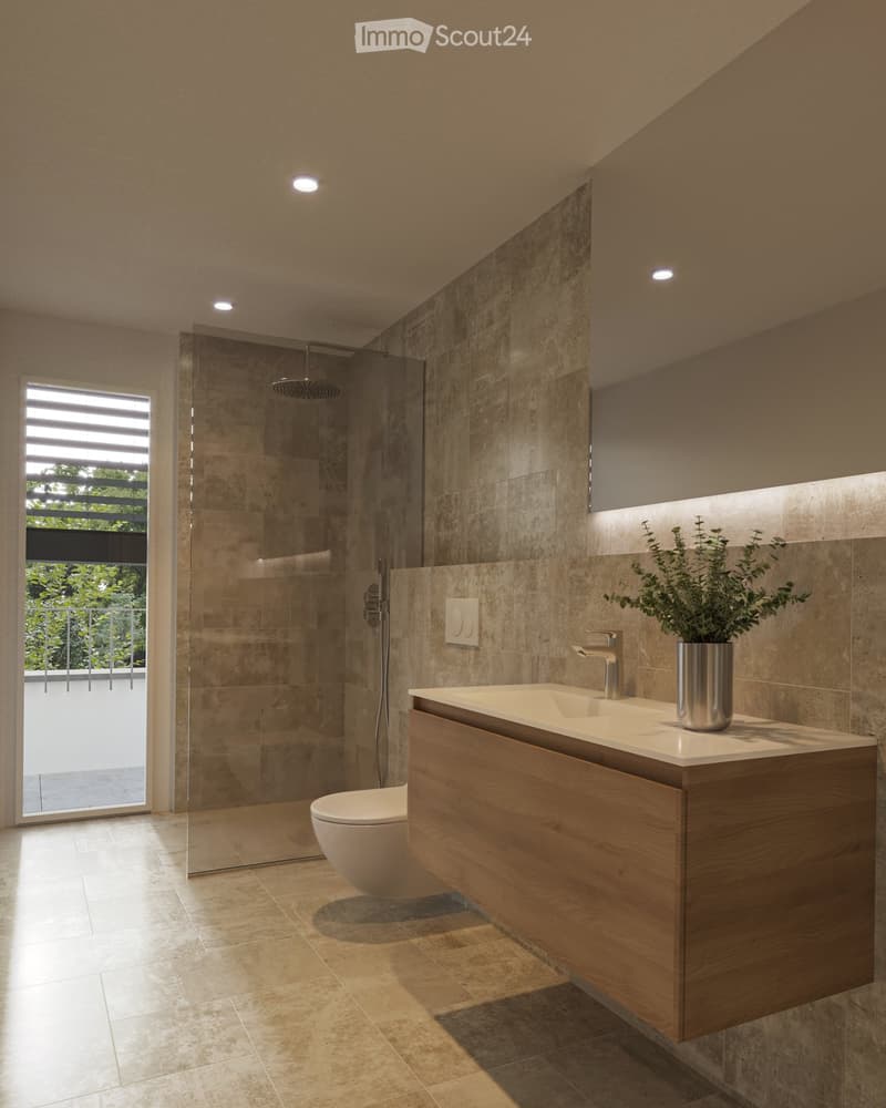 Modern bathroom with a wooden vanity, sink, faucet, toilet, glass-enclosed shower, and a potted plant on the counter.