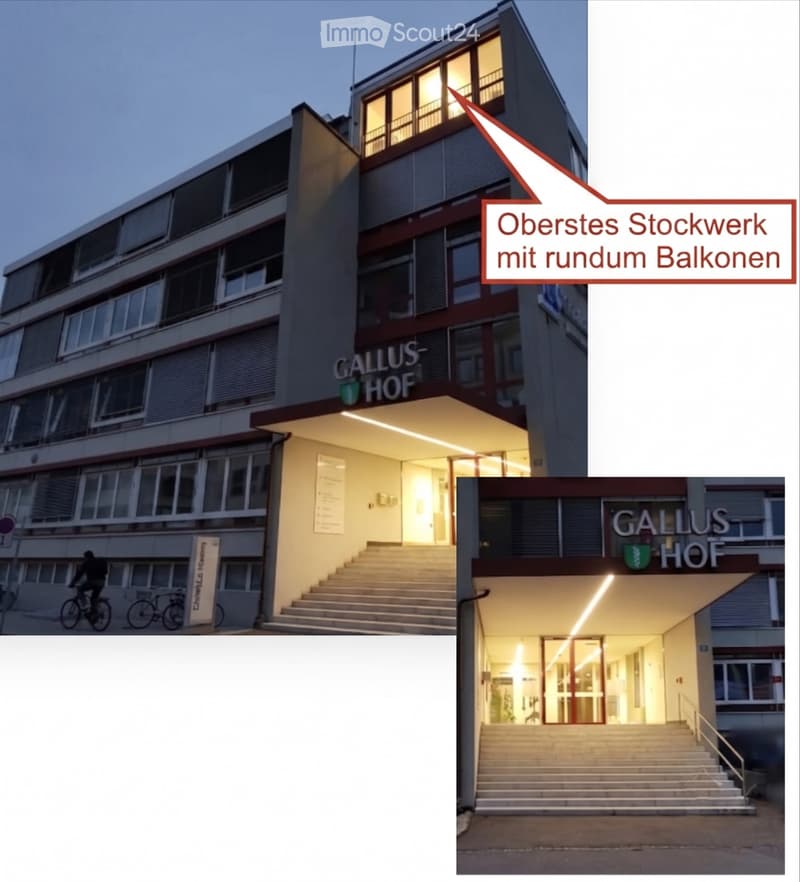 Multi-story building with modern design, large windows, illuminated entrance, and balconies on the top floor.