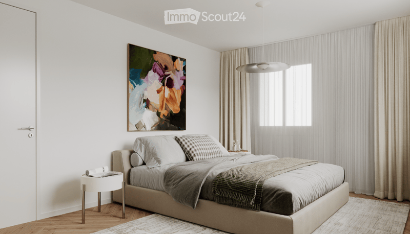 Modern bedroom with a large bed, nightstand, painting on the wall, and sheer curtains covering a window. The room features light-colored walls and wooden flooring.