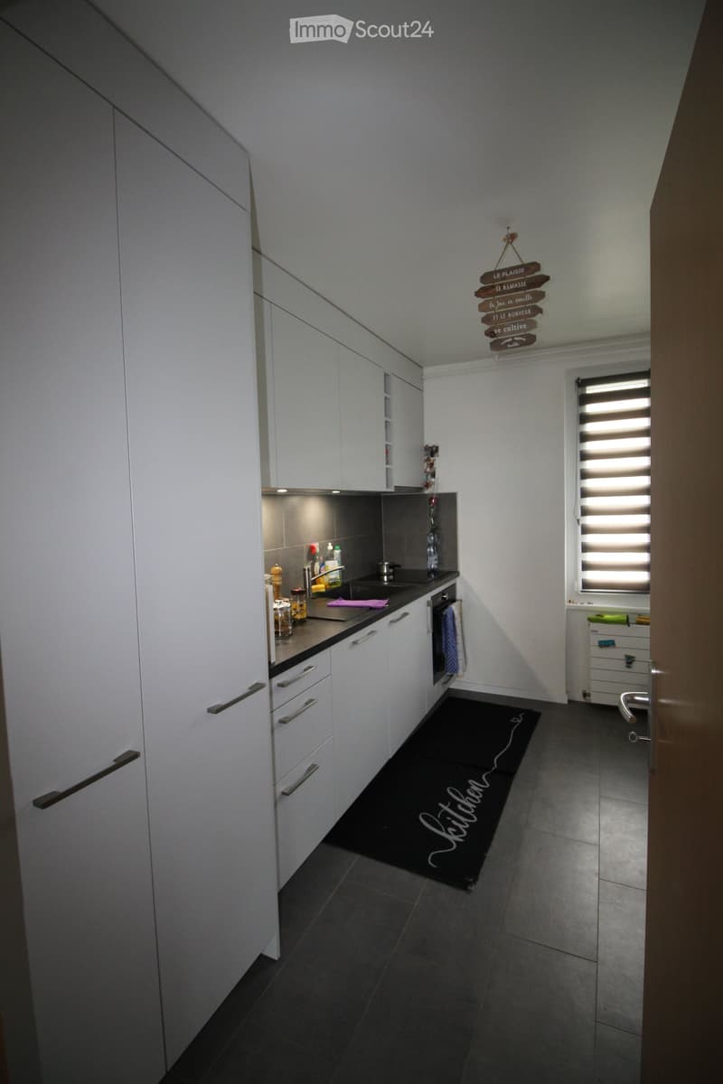 {"type": "Kitchen", "objects": ["sink", "faucet", "oven", "cabinet", "drawer", "bottle", "faucet", "bottle", "bottle", "bottle", "bottle", "bottle", "bottle", "bottle", "bottle", "bottle", "bottle", "bottle", "bottle", "bottle", "bottle", "bottle", "bottl