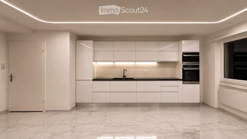 Modern kitchen with white cabinets, black countertop, marble flooring, and built-in oven.